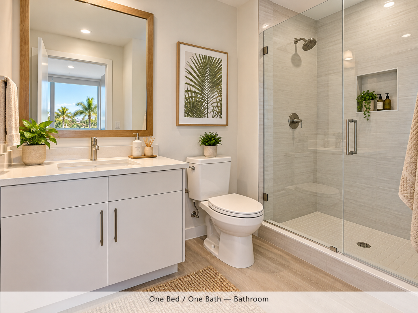 Bathroom with a white vanity, wood-look plank flooring, and a glass-enclosed tiled walk-in shower.
